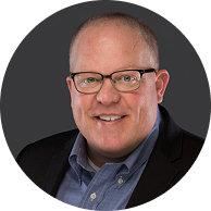 Professional headshot of John Hemenway, Chief Executive Operating Officer and Chief Financial Officer at VirtuAlly.